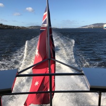 Red Ensign at rear of MONA vessel